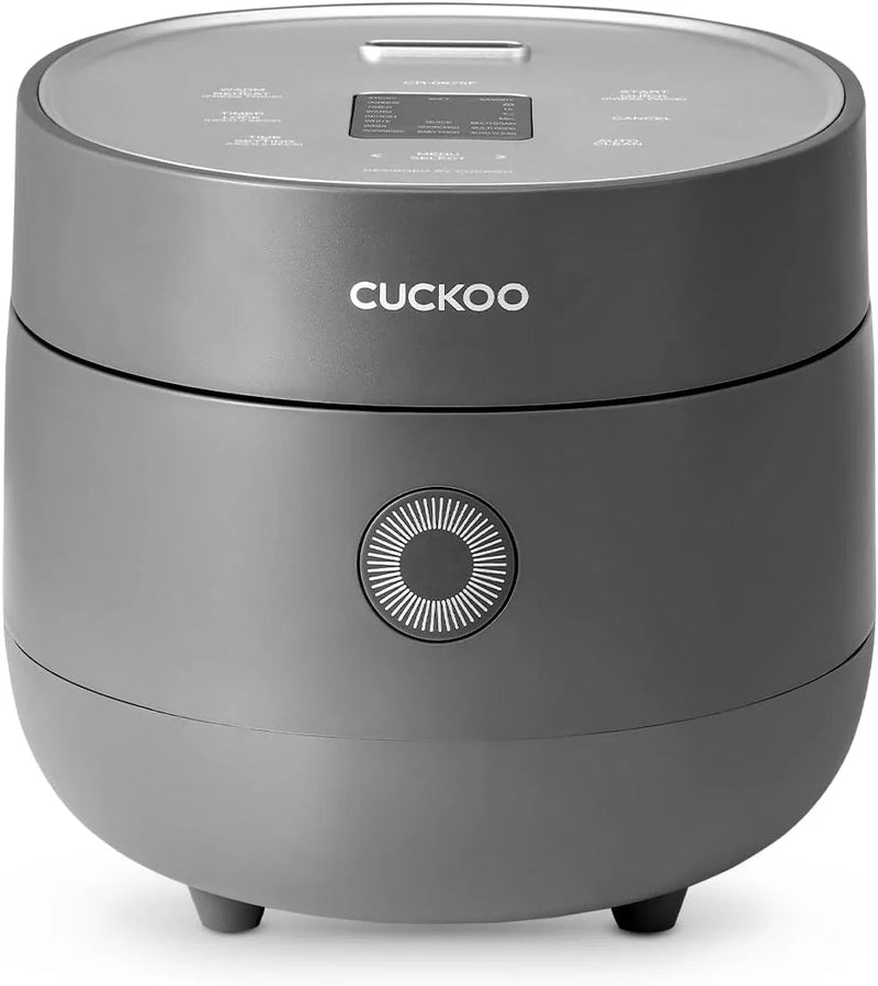 Electric rice cooker with 6-cup capacity (uncooked) / 12-cup capacity (cooked), modern fuzzy logic control, featuring timer function and insulation setting, compact model, multi-functional steamer, non-stick inner liner, gray exterior. K4138